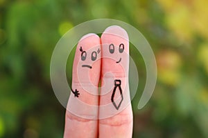 Fingers art of couple. Concept of man harassing woman photo