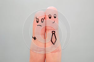 Fingers art of couple. Concept of man harassing woman at work photo