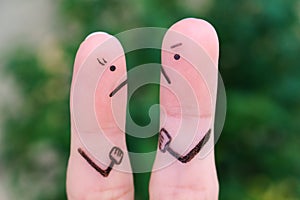 Fingers art of couple during quarrel