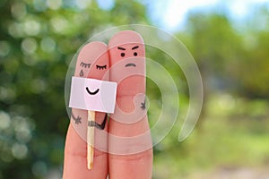 Fingers art of couple. woman hiding emotions, man is