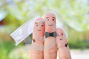 Fingers art of Happy couple to get married. Concept of stepson is joy about wedding