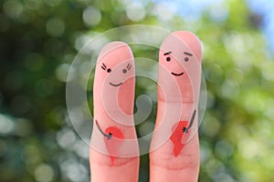Fingers art of happy couple. Woman and man holding broken heart.