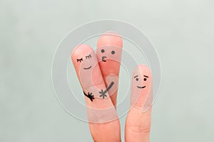 Fingers art of happy family. Concept of couple kissing, child is happy