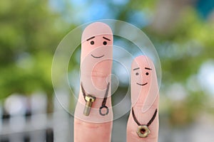 Fingers art of happy family. Concept father teaches son to repair