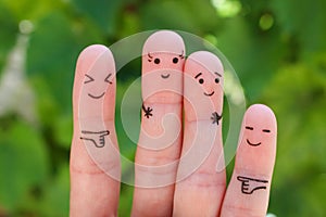Fingers art of people. Concept woman taller than man, around laugh at them photo