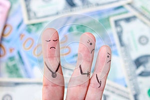 Fingers art of wife leaves a husband because he earns little. The concept of divorce photo