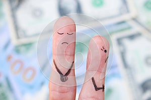 Fingers art of a woman leaves a man because he earns little