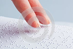 Fingers and Braille. Blind read.