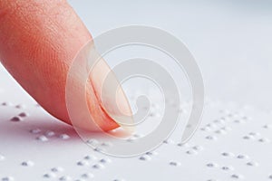 Fingers and Braille. Blind read.