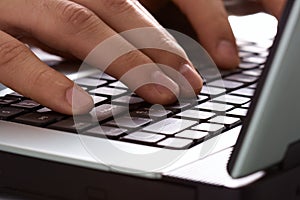 Fingers on the laptop