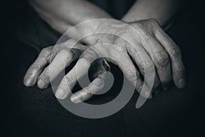 Fingers of the old man's hands