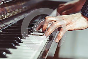Fingers on the piano