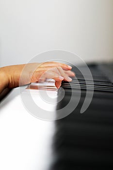 Fingers on a piano keys stock photo