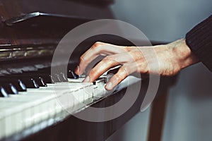 Fingers on the piano photo