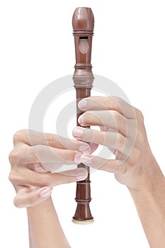 Fingers playing soprano flute