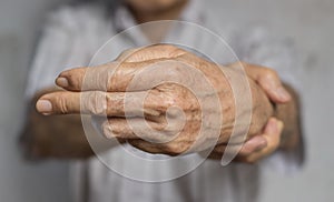 Fingers rigidity, Hand muscles spasm, or Weakness of digits