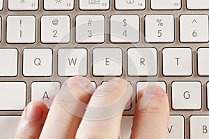 Fingers Typing on a Computer Keyboard