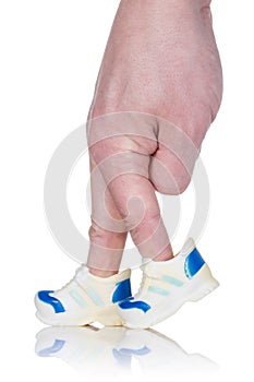 Fingers wearing sports trainers