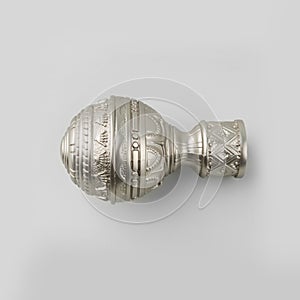 Finials for curtain cornices.