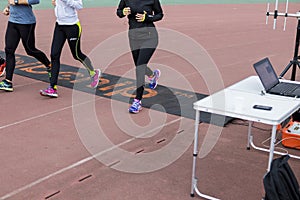 Runners passing a timekeeping checkpoint