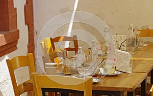 Finished dinner with used tabelware and glasses during summer in Cyprus