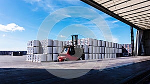 Forklift loader at warehouse outdoors