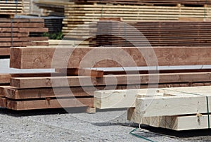 Finished lumber in lumberyard photo
