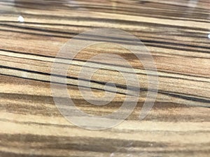 A Finished Polished wooden grains over a Laminated or veneered finishes for an Table top counter for an Luxurious Look Carpentry