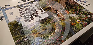 Almost finished very complicated and huge puzzle with natural picture photo