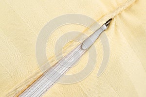 Finishing edging in the sewn seam of the pillowcase, with a zipper, cotton fabric