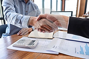 Finishing up a meeting collaboration, Handshake of two business people collaboration after contract agreement to become a partner