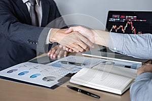 Finishing up a meeting, Handshake of two executive business people after contract agreement to become a partner, collaborative