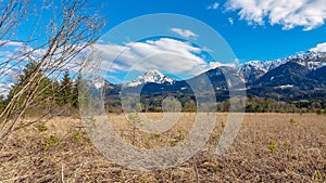 Finkenstein - Scenic view of majestic snow capped mountain peak Mittagskogel in wild Karawanks, Carinthia, Austria