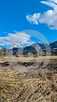 Finkenstein - Scenic view of majestic snow capped mountain peak Mittagskogel in wild Karawanks, Carinthia, Austria