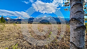 Finkenstein - Scenic view of majestic snow capped mountain peak Mittagskogel in wild Karawanks, Carinthia, Austria