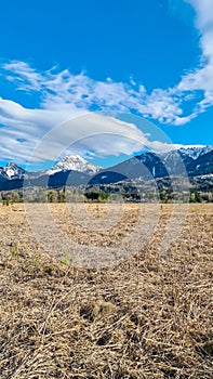 Finkenstein - Scenic view of majestic snow capped mountain peak Mittagskogel in wild Karawanks, Carinthia, Austria