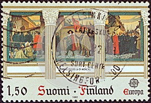 FINLAND - CIRCA 1982: A stamp printed in Finland shows `The Inauguration of Turku Academy 1640`  painting by Albert Edelfelt