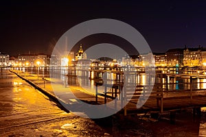 Finland, Helsinki, 03 March 2021.  Night panorama of Helsinki, a view of the Katajanokka and Krununhakka districts in the foregrou