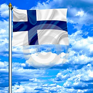 Finland waving flag against blue sky