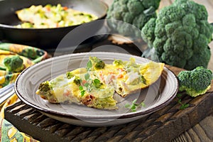 Finnish, omelet with broccoli, farel, potatoes and onions. Rustic style.