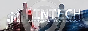 FINTECH - Financial technology, global business and information Internet communication technology. Skyscrapers background. Hi-tech