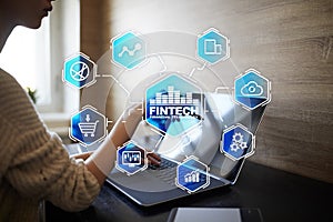 Fintech. Financial technology text on virtual screen. Business, internet and technology concept.