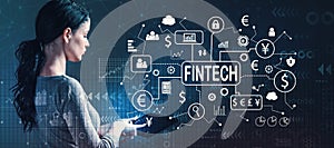 Fintech theme with woman using a tablet