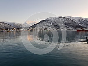 Fiords in Tromso in norway while short Day in winter photo