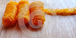 `Fios de ovos or Foi thong`  dessert made from egg yolks. photo