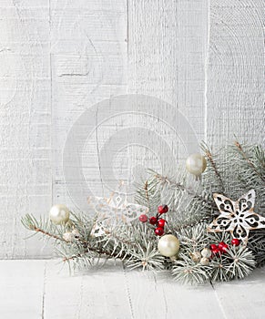 Fir branch with Christmas decorations