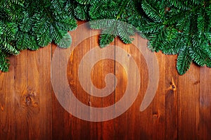 Fir branches on wooden boards