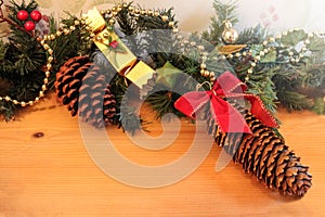 Fir cone ribbon and cracker traditional Christmas decorations