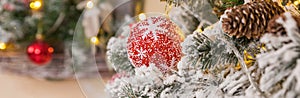 fir tree background and festive decorations with snow, blurred, sparking, glowing. Happy New Year.holidays decoration