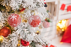 fir tree background and festive decorations with snow, blurred, sparking, glowing. Happy New Year.holidays decoration